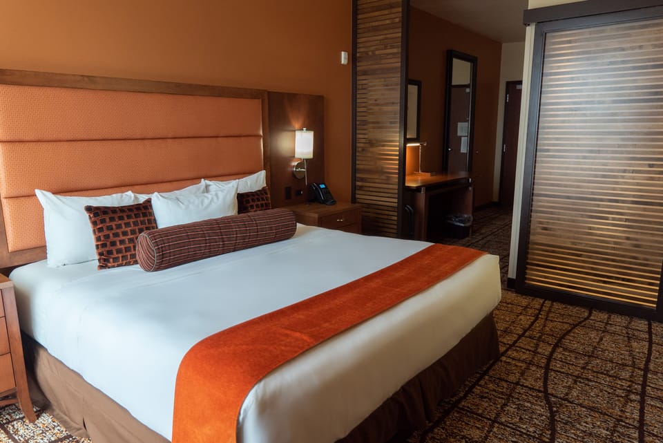 Suite, 1 King Bed, Accessible (Luxury King Suite - Non Smoking) | Hypo-allergenic bedding, in-room safe, desk, laptop workspace