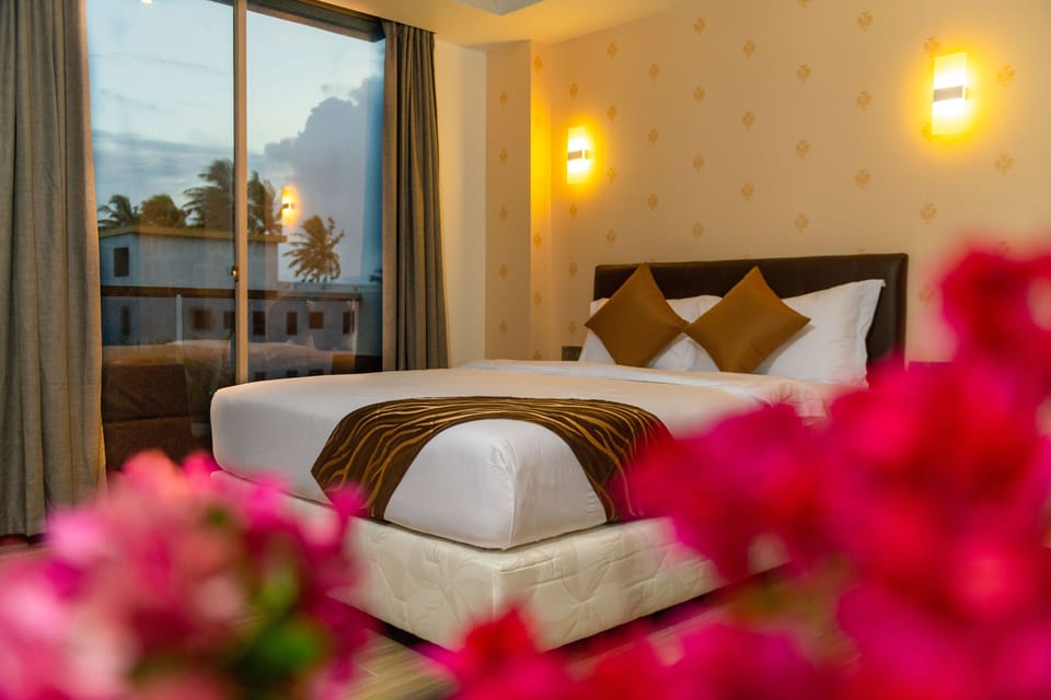 Down comforters, memory foam beds, minibar, in-room safe