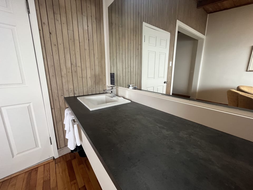 Junior Suite, 1 Queen Bed | Iron/ironing board, free WiFi, bed sheets
