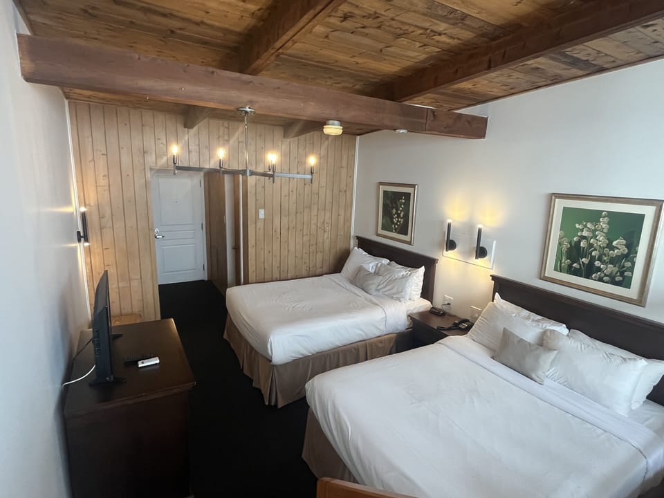 Room, 2 Queen Beds | Iron/ironing board, free WiFi, bed sheets