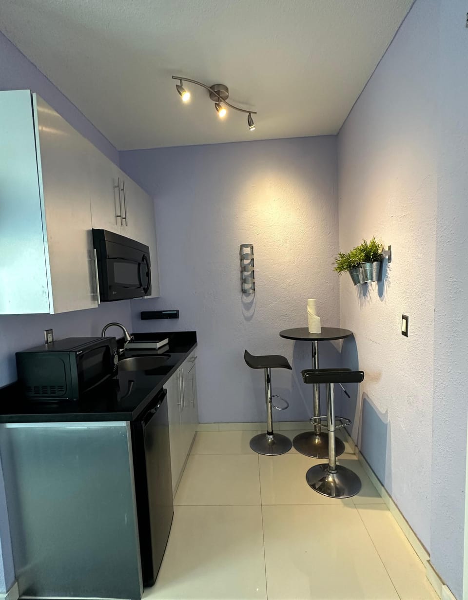 Mini-fridge, microwave, coffee/tea maker
