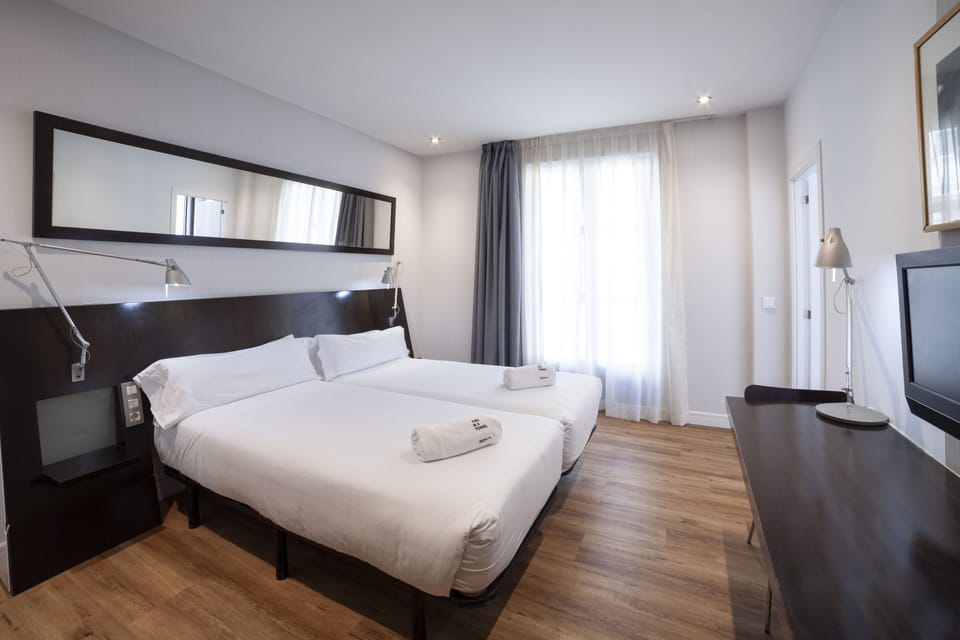 Superior Double Room, City View | Minibar, in-room safe, desk, blackout drapes