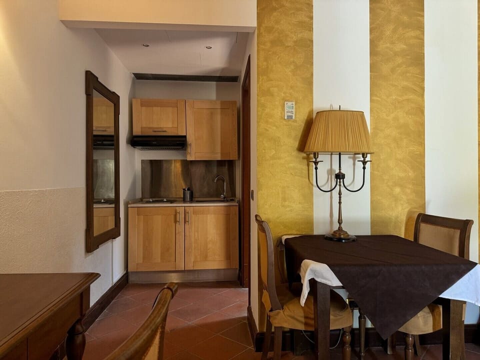 Comfort Triple Room, 1 Bedroom | Private kitchen | Fridge