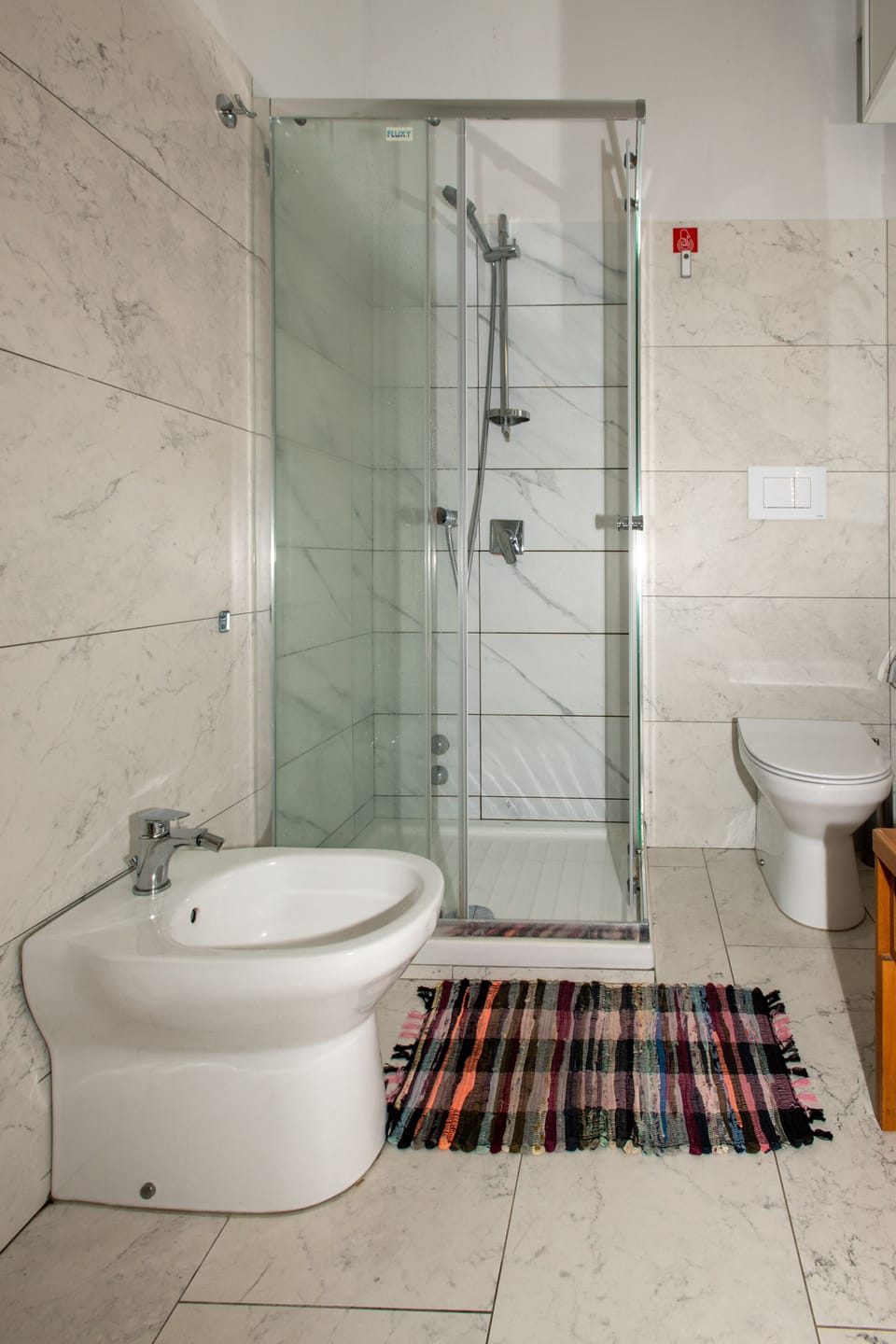 Shower, rainfall showerhead, hair dryer, towels