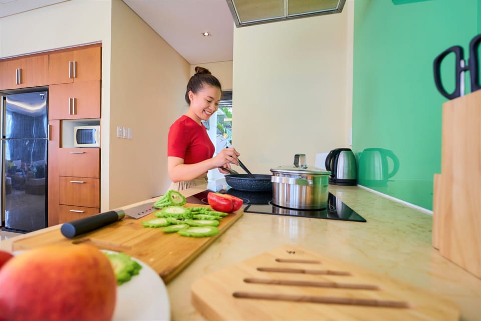 Full-size fridge, microwave, stovetop, rice cooker