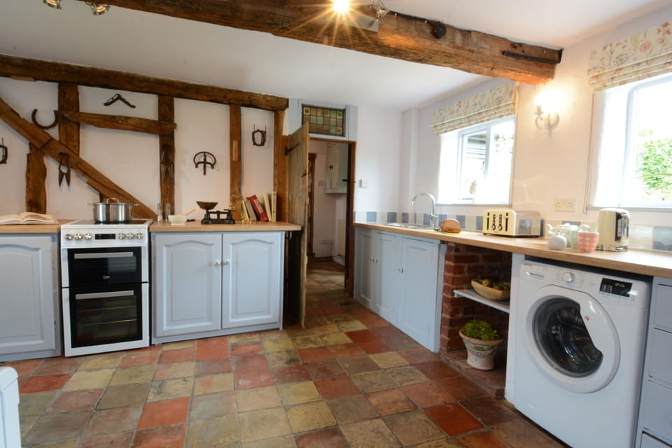 Fridge, microwave, cookware/dishes/utensils