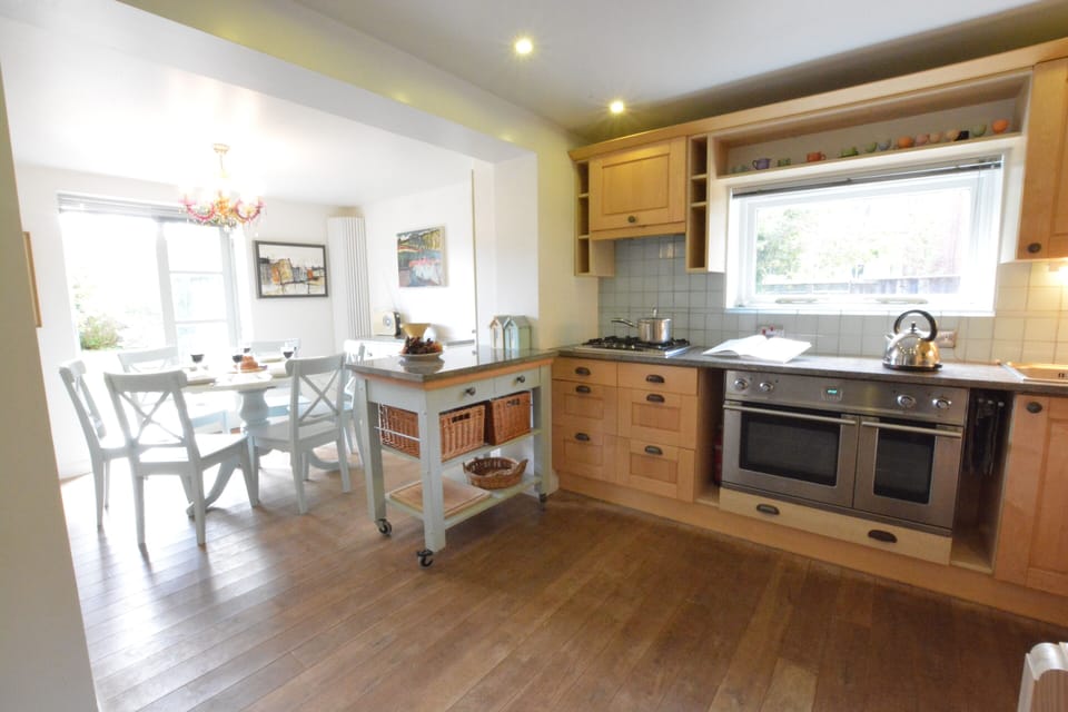 Fridge, microwave, cookware/dishes/utensils