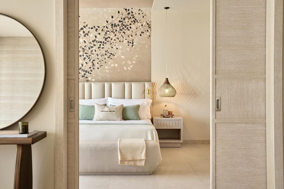 Designer toiletries, hair dryer, bathrobes, slippers