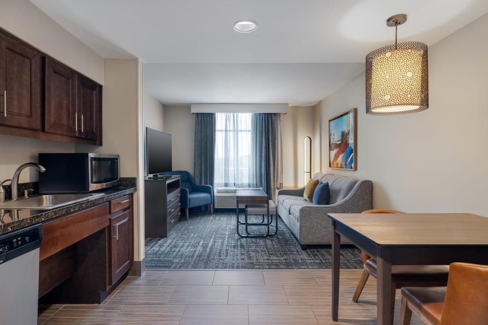 Suite, 1 King Bed, Accessible, Bathtub | Living area | 39-inch flat-screen TV with cable channels, TV