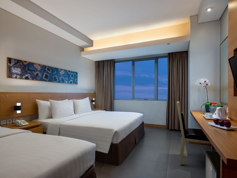 Superior Triple Room | Minibar, in-room safe, desk, soundproofing
