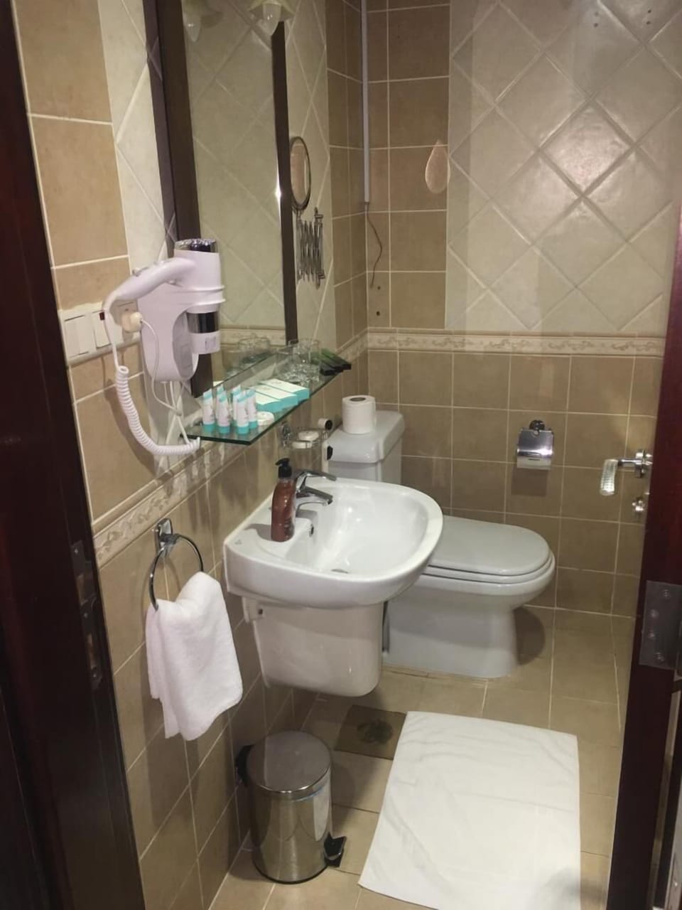 Separate tub and shower, designer toiletries, hair dryer, towels