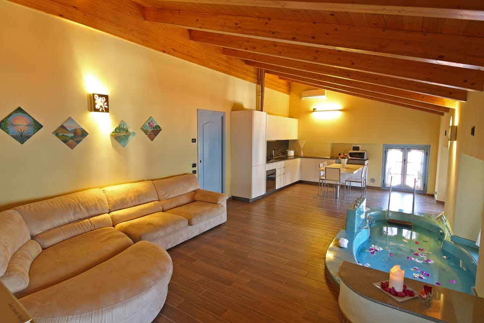 Apartment, 3 Bedrooms, Hot Tub (L'Onda) | Private kitchen | Espresso maker, electric kettle, highchair