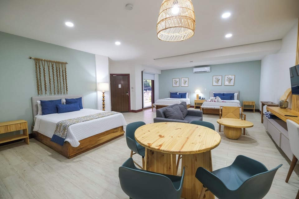 Family Studio Suite | Living area | 40-inch Smart TV with digital channels, TV, Netflix