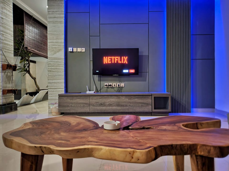 Villa with Private Pool | Living area | 34-inch Smart TV with digital channels, TV, Netflix
