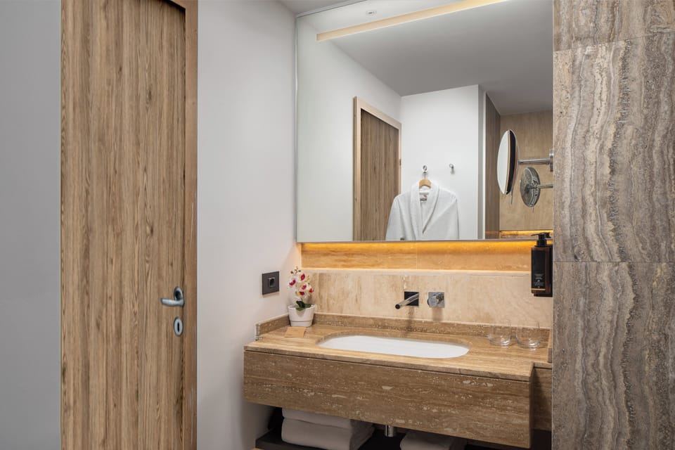 Shower, eco-friendly toiletries, hair dryer, towels