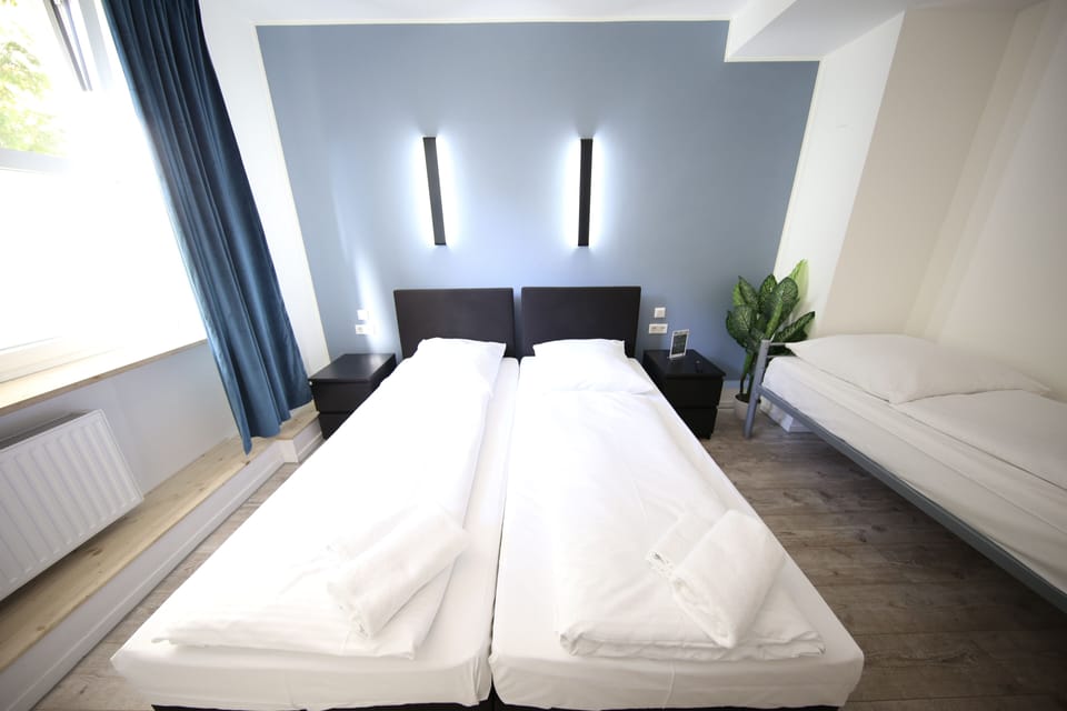 Premium bedding, blackout drapes, WiFi (free), bed sheets