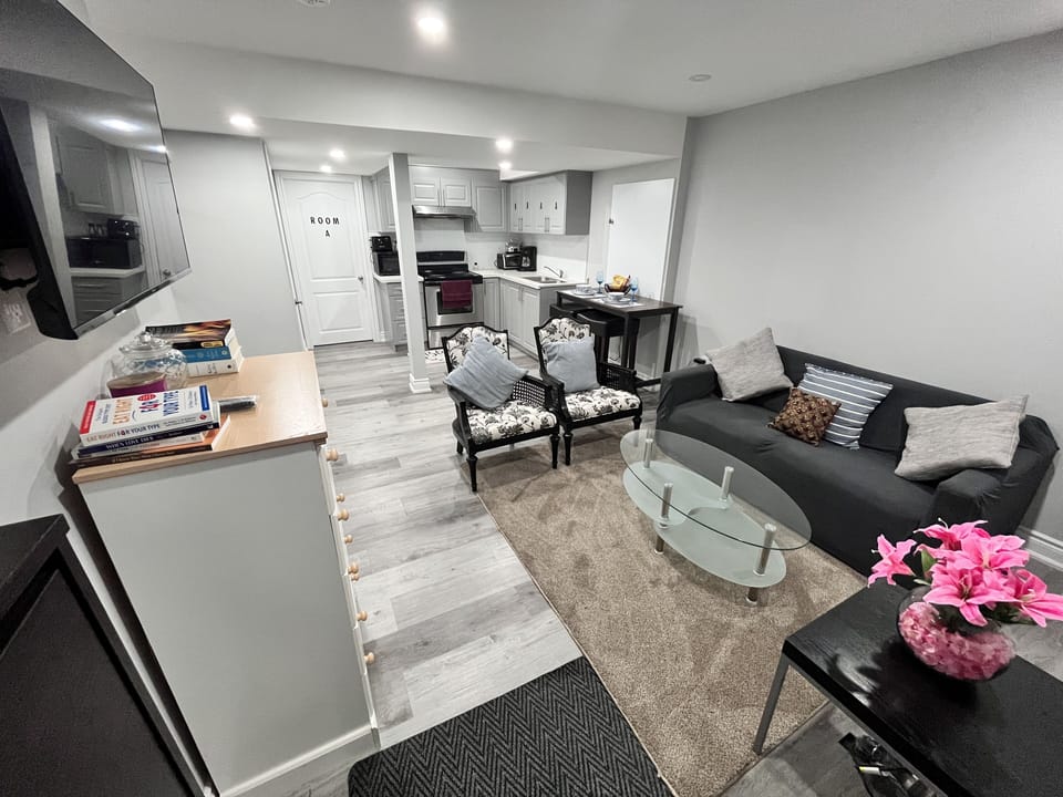 Luxury Apartment | Living area | Toys, pay movies, printers