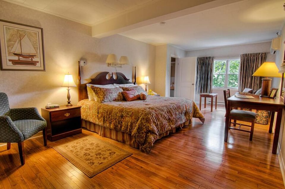 King Room | Desk, blackout drapes, iron/ironing board (on request), cribs (free)
