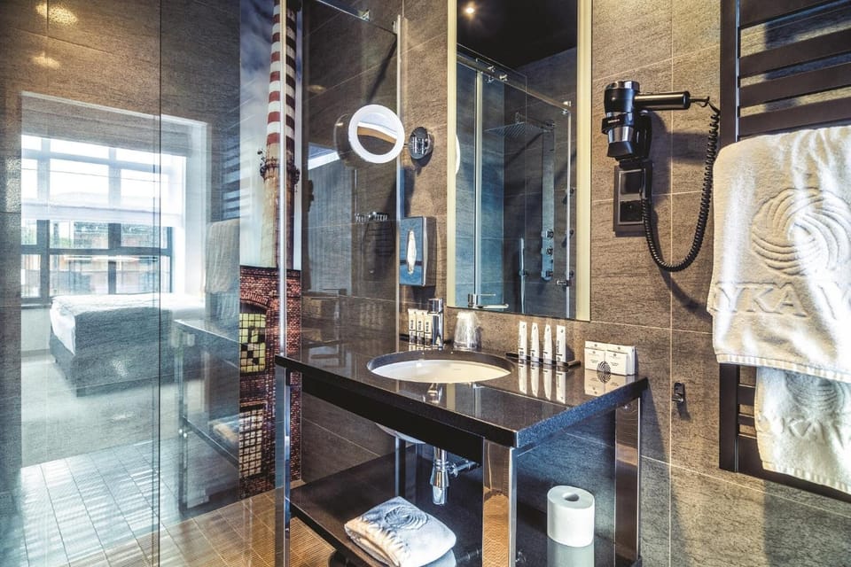 Shower, free toiletries, hair dryer, slippers