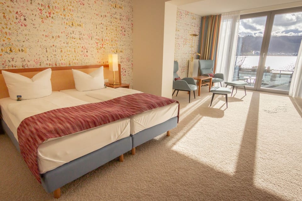 Junior Suite, Patio, Lake View | Hypo-allergenic bedding, minibar, in-room safe, individually decorated