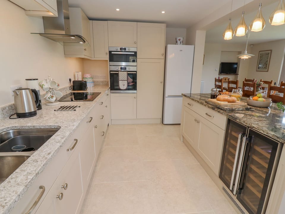 Fridge, dishwasher, electric kettle, cookware/dishes/utensils
