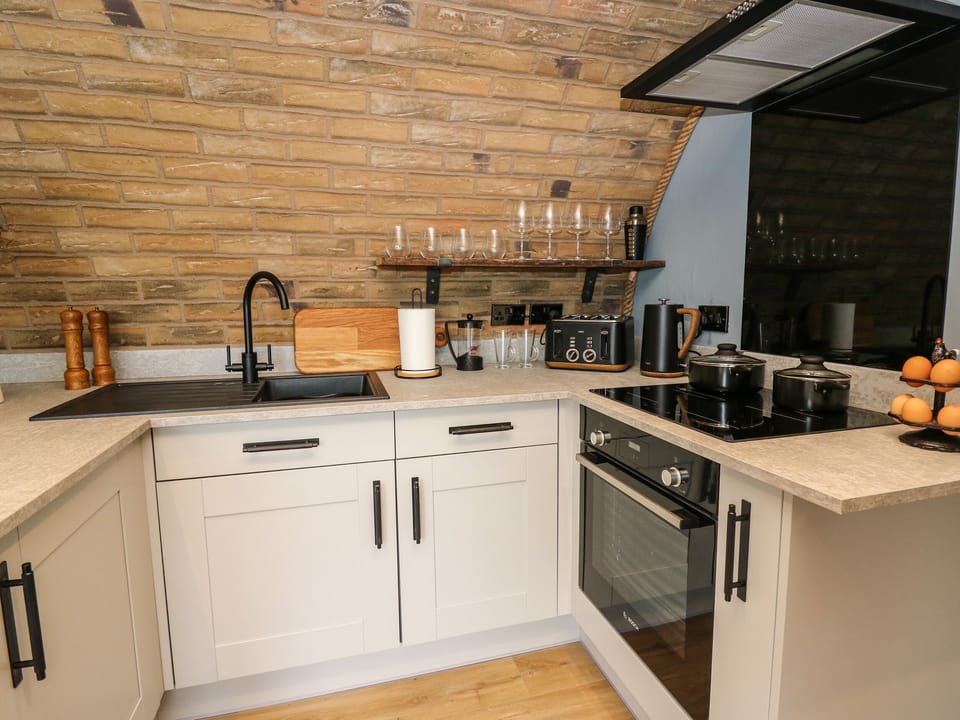 Fridge, electric kettle, toaster, cookware/dishes/utensils