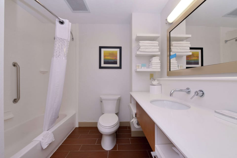 Bathtub, bathrobes, towels