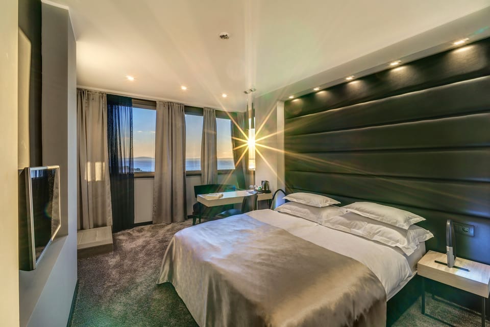 Deluxe Double Room, Sea View | Premium bedding, minibar, in-room safe, desk