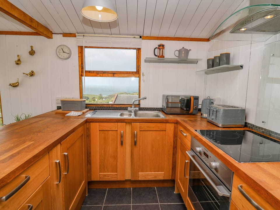 Fridge, electric kettle, toaster, cookware/dishes/utensils