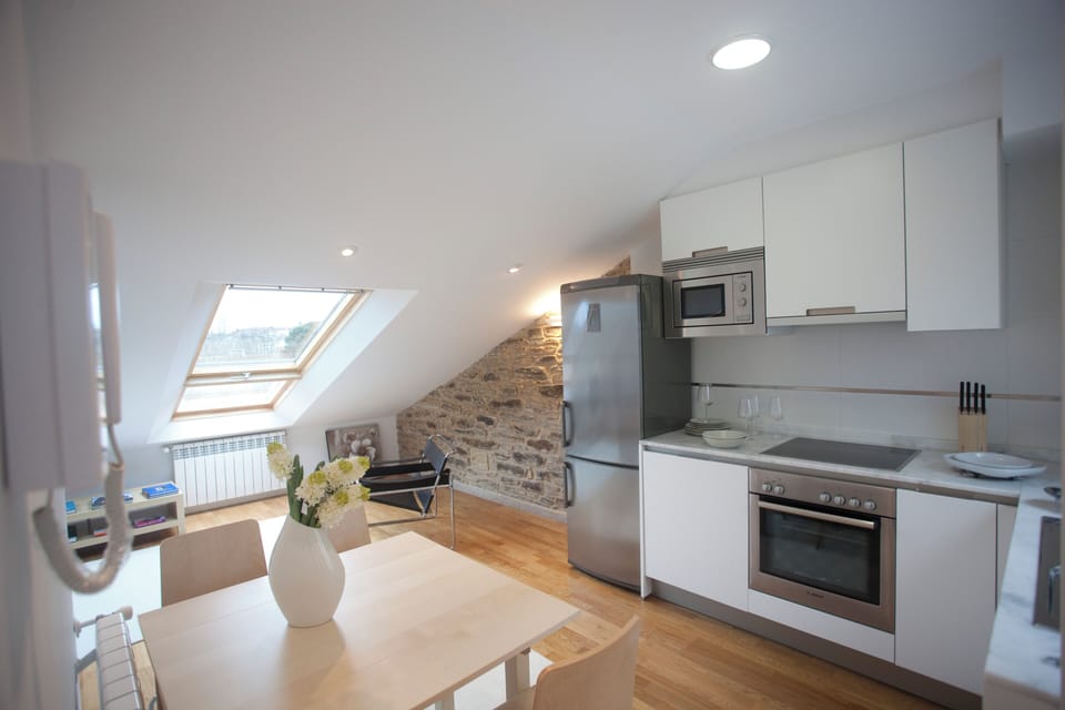 Penthouse, 1 Bedroom, City View (Galo - Attic) | Private kitchen | Full-size fridge, microwave, oven, dishwasher