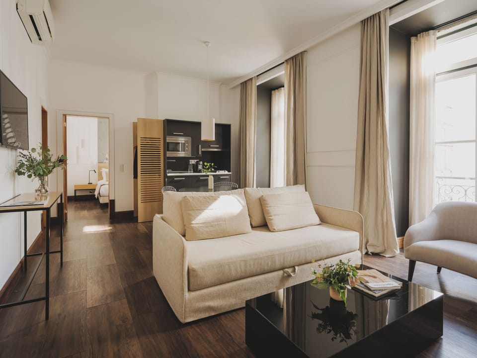Apartment, 1 Bedroom | Living area | 43-inch flat-screen TV with cable channels, TV