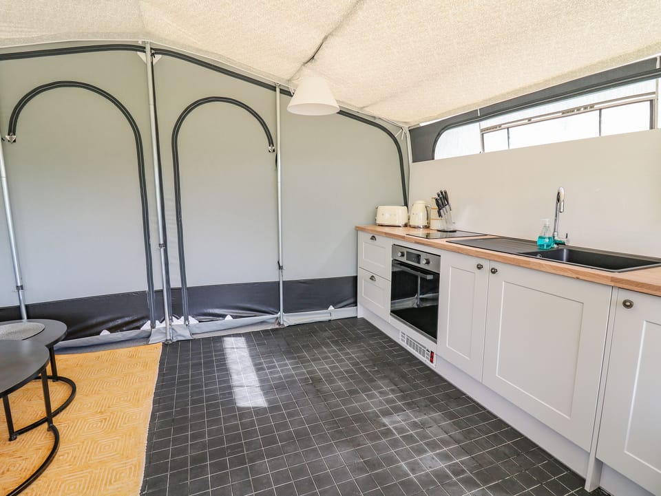 Fridge, electric kettle, toaster, cookware/dishes/utensils