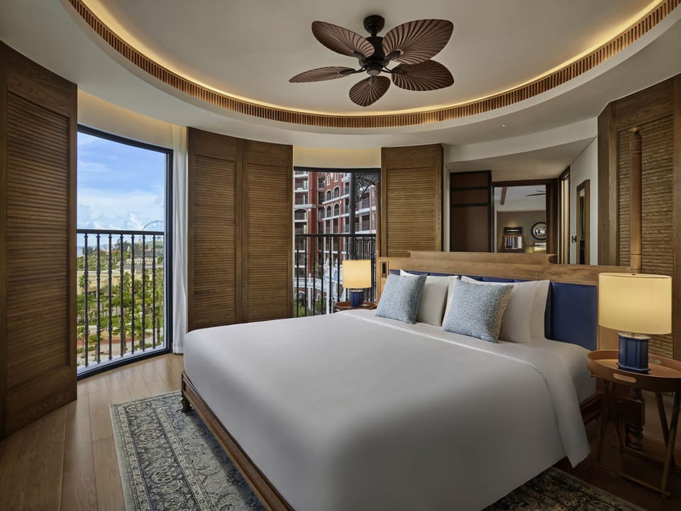 Suite, 1 King Bed, Sea View | Minibar, in-room safe, soundproofing, iron/ironing board