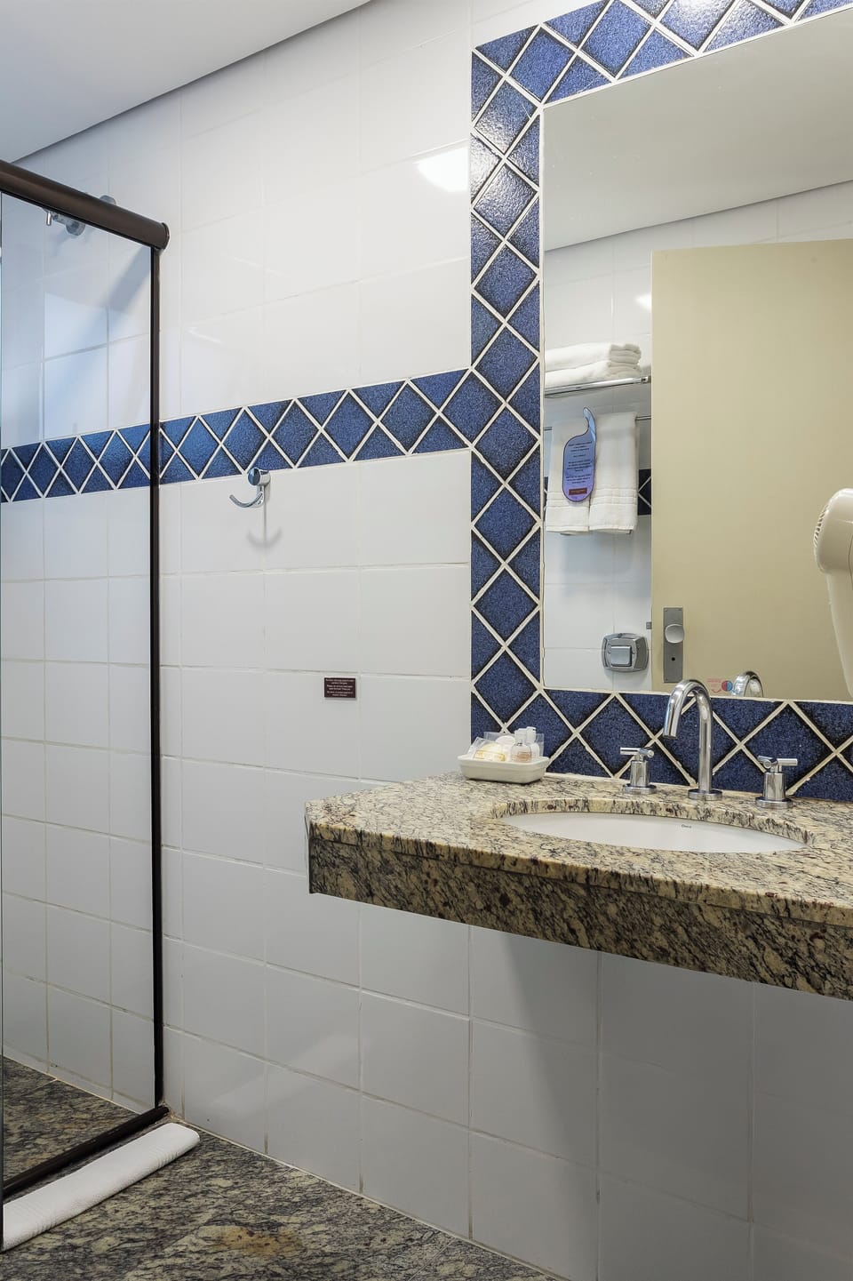 Shower, free toiletries, hair dryer, towels