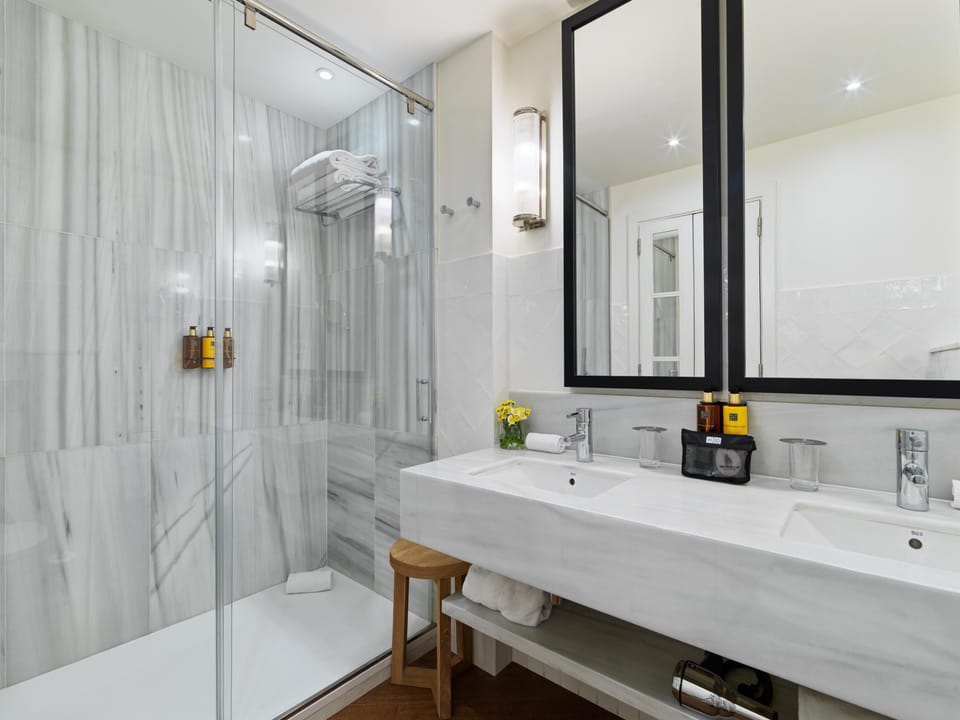 Shower, rainfall showerhead, eco-friendly toiletries, hair dryer