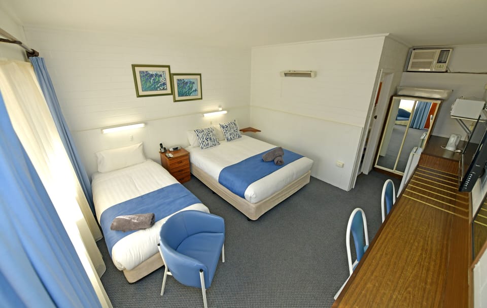 Deluxe Triple Room, Garden View | Free WiFi, bed sheets