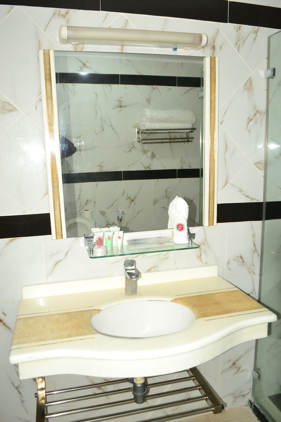 Separate tub and shower, rainfall showerhead, free toiletries