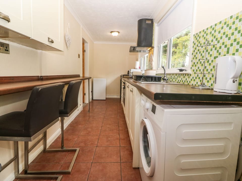 Fridge, electric kettle, toaster, cookware/dishes/utensils