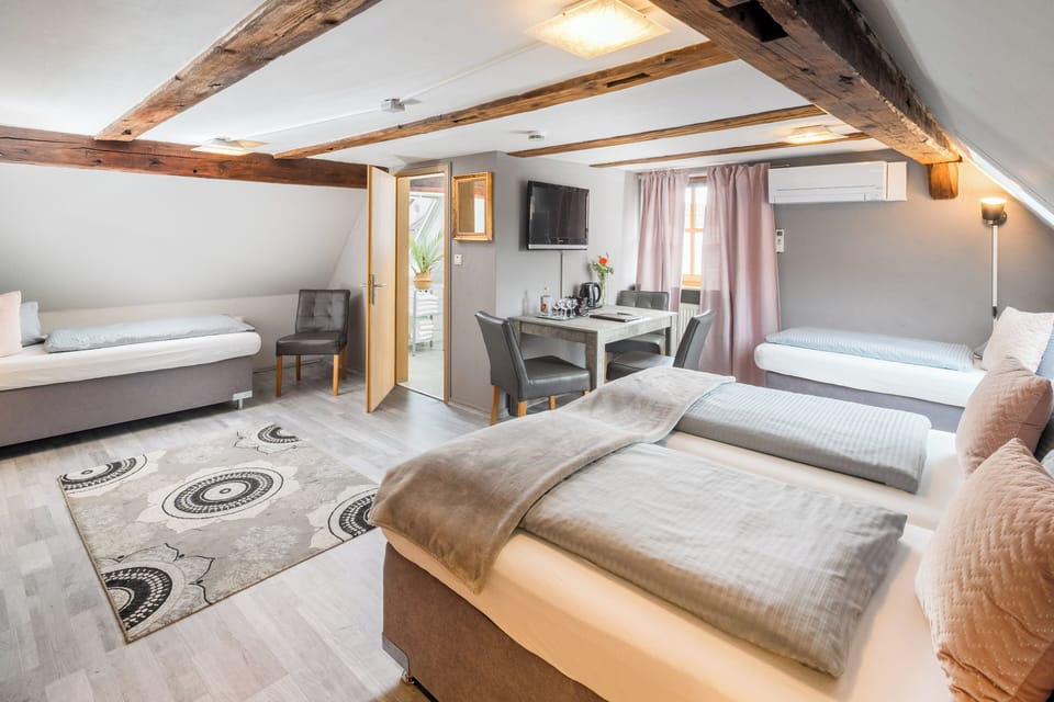 Comfort Quadruple Room | Hypo-allergenic bedding, down comforters, minibar, in-room safe