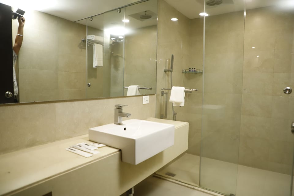 Shower, free toiletries, hair dryer, slippers