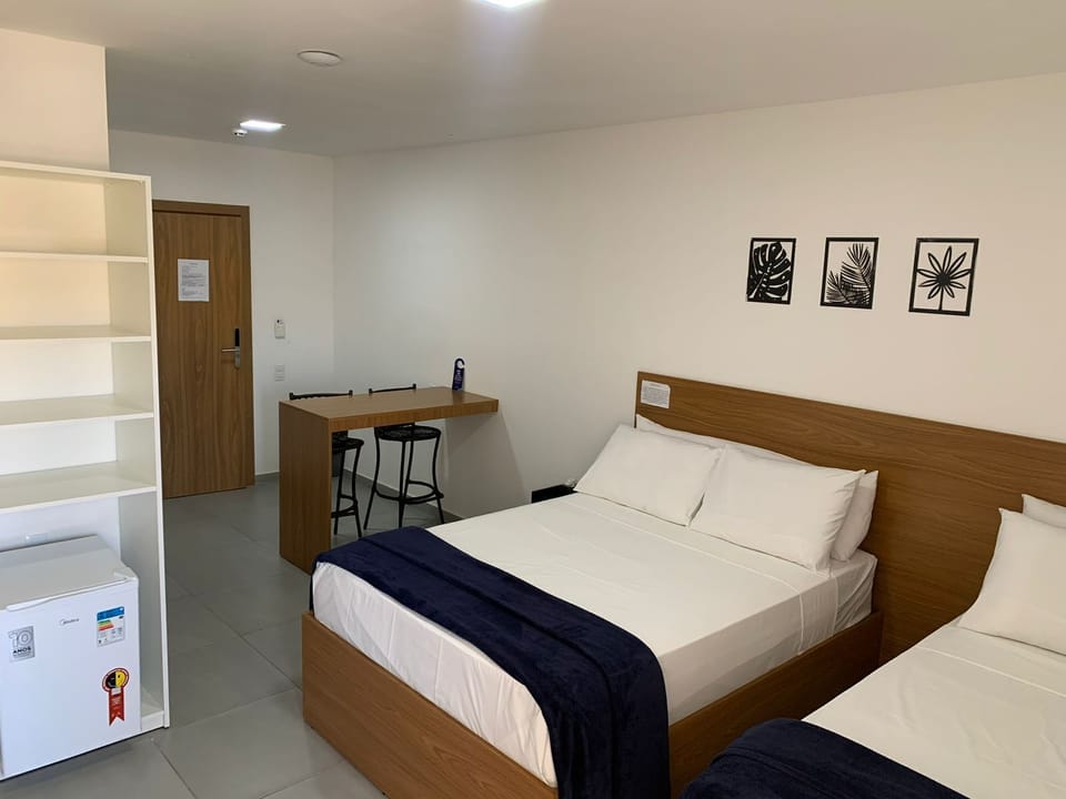 Basic Triple Room, Multiple Beds, City View | Desk, laptop workspace, free WiFi, bed sheets