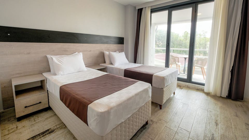 Egyptian cotton sheets, premium bedding, minibar, in-room safe