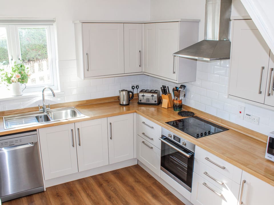 Fridge, dishwasher, electric kettle, cookware/dishes/utensils