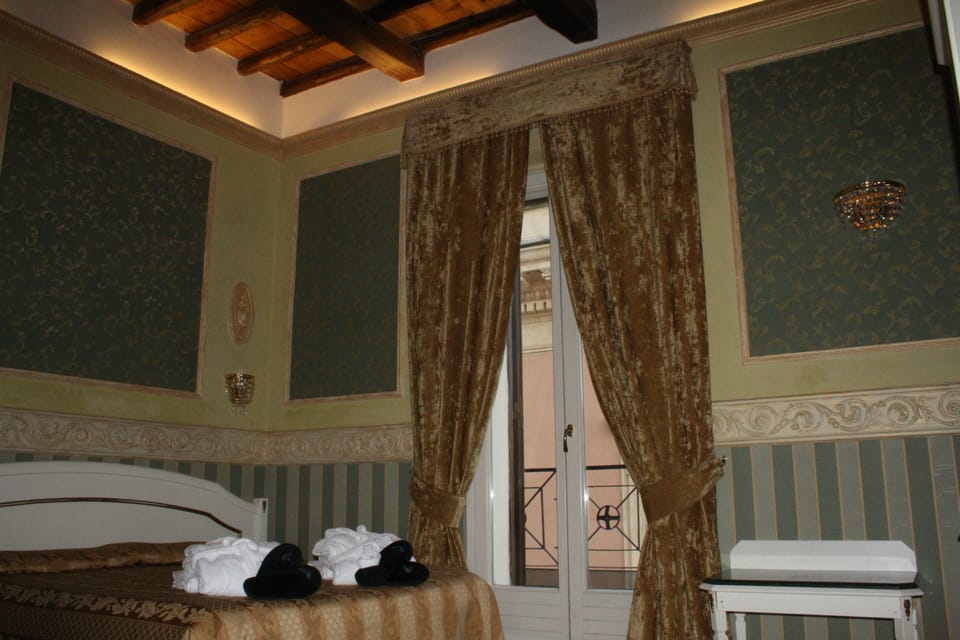 Deluxe Triple Room | In-room safe, desk, laptop workspace, blackout drapes