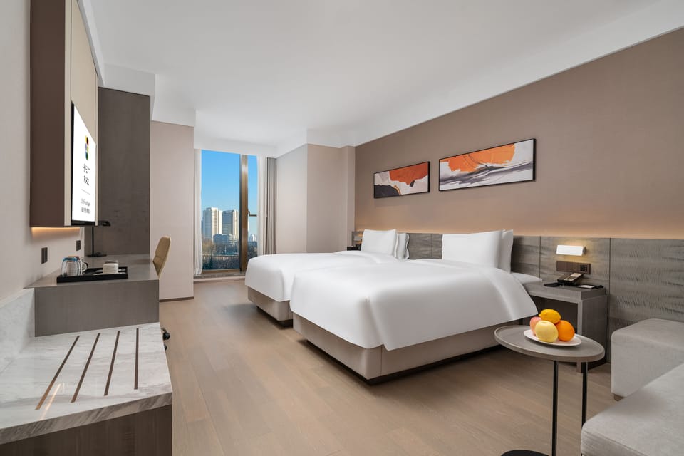 Room, Multiple Beds, Garden View | In-room safe, soundproofing, iron/ironing board, free WiFi