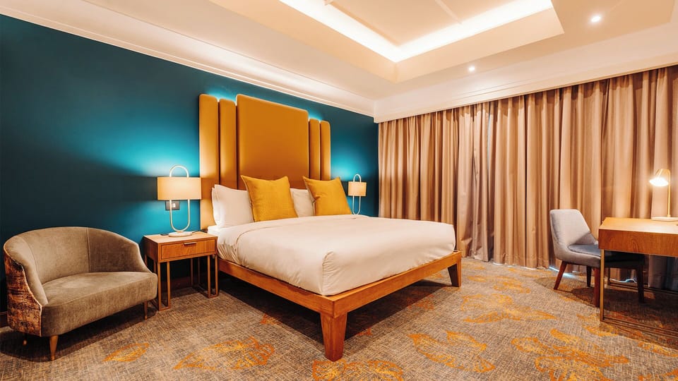Down comforters, memory foam beds, in-room safe, desk