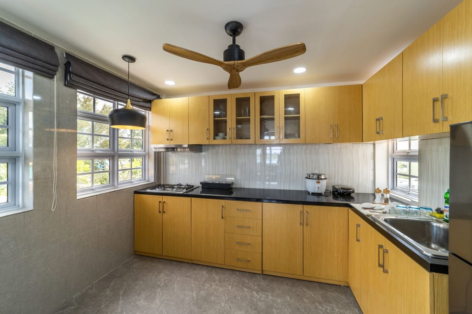 Family Apartment | Private kitchen | Coffee/tea maker, electric kettle, highchair