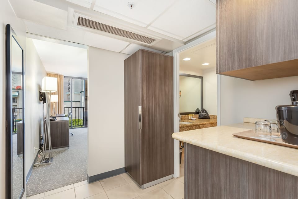 Studio, Partial Ocean View | In-room safe, laptop workspace, blackout drapes, iron/ironing board