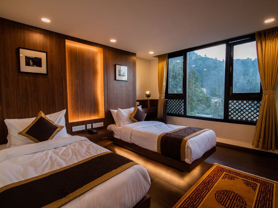 Deluxe Double or Twin Room | Desk, laptop workspace, WiFi (free), individually furnished
