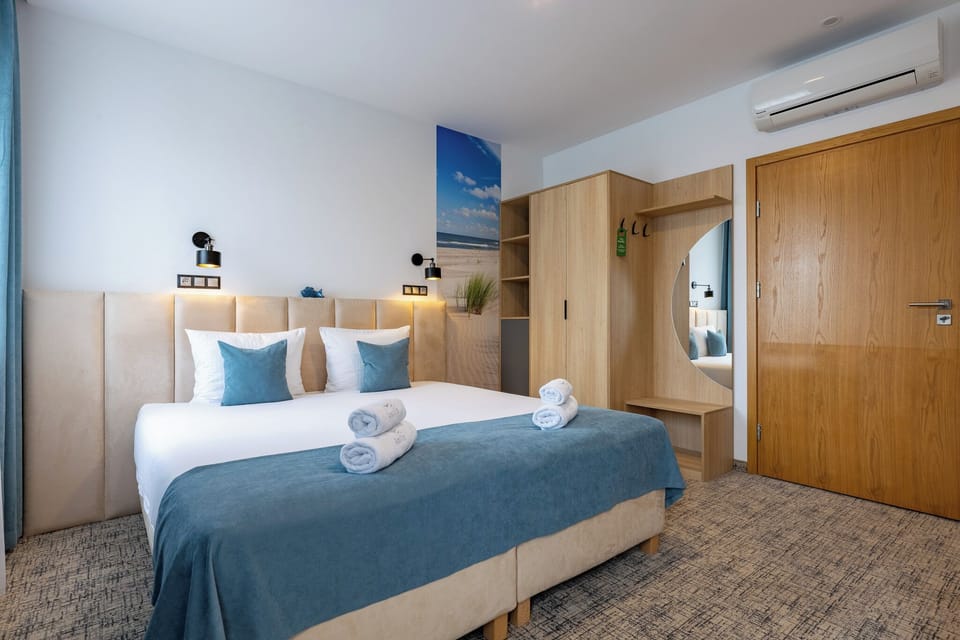 Economy Room | 1 bedroom, in-room safe, desk, laptop workspace